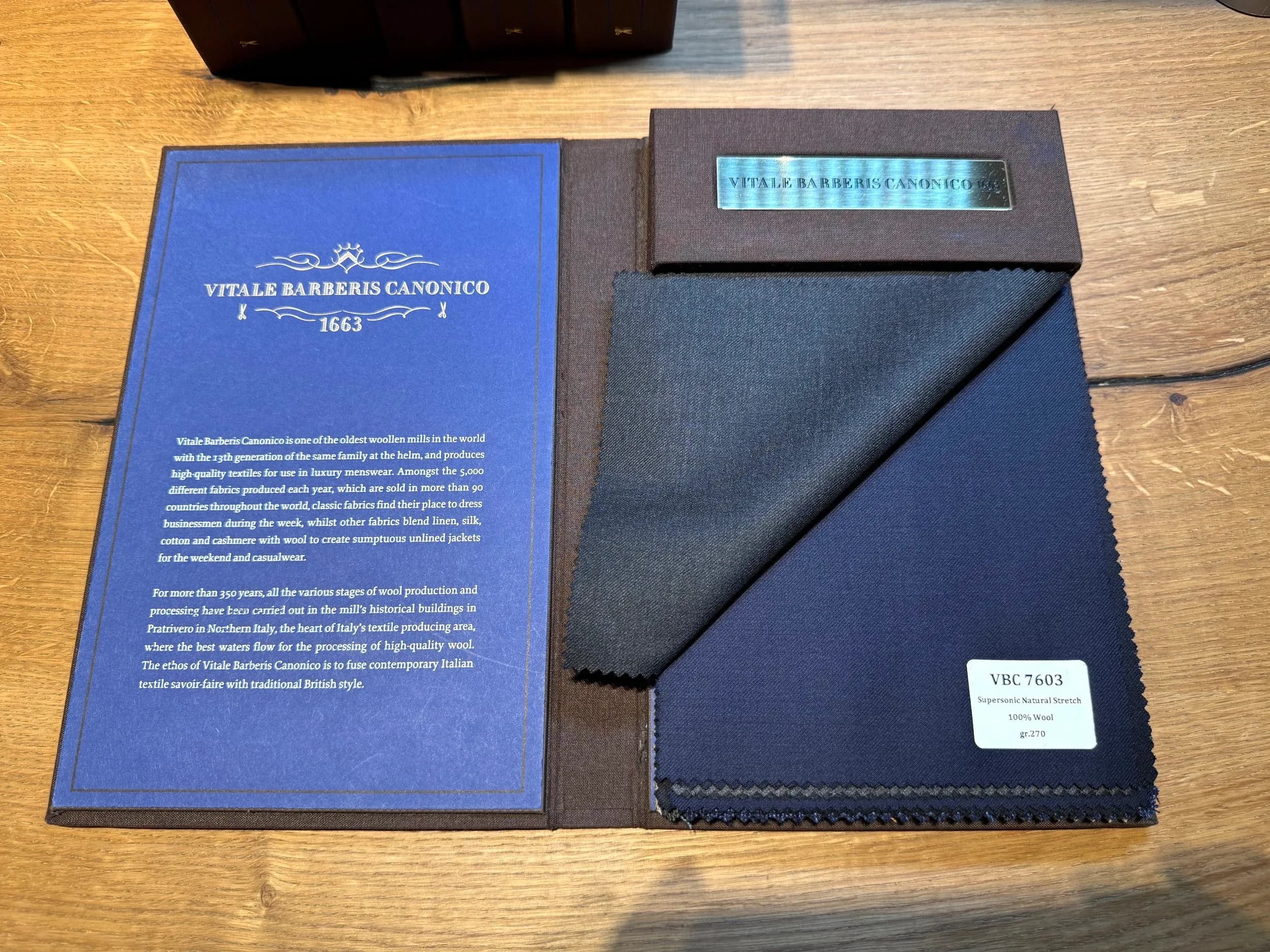 VBC Supersonic swatch book with solid charcoal grey and navy stretch wool swatches