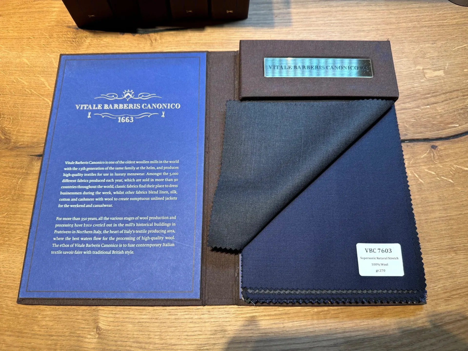 VBC Supersonic swatch book with solid charcoal grey and navy stretch wool swatches