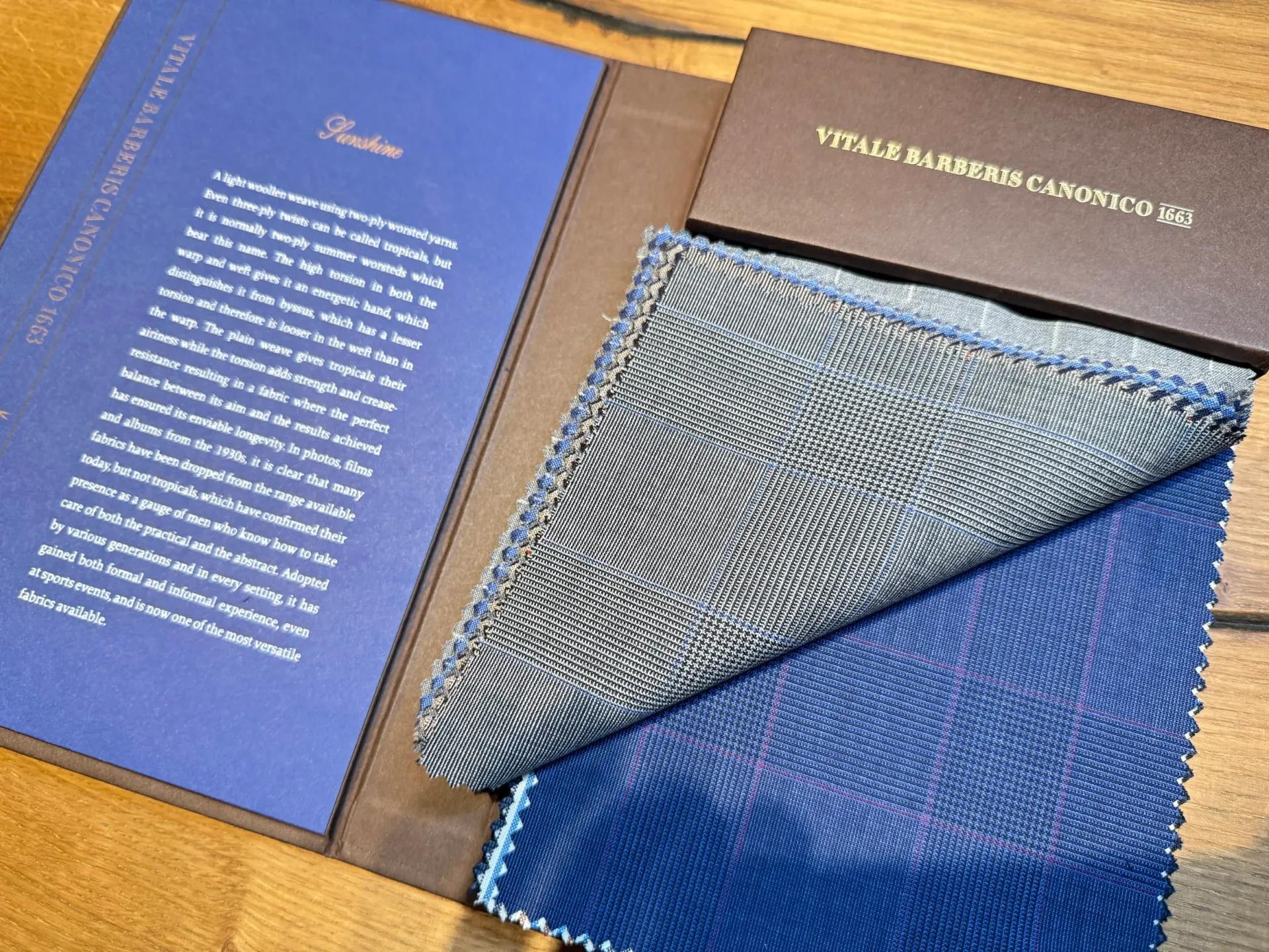VBC Sunshine Super 120s book with grey Prince of Wales check and solid blue swatches