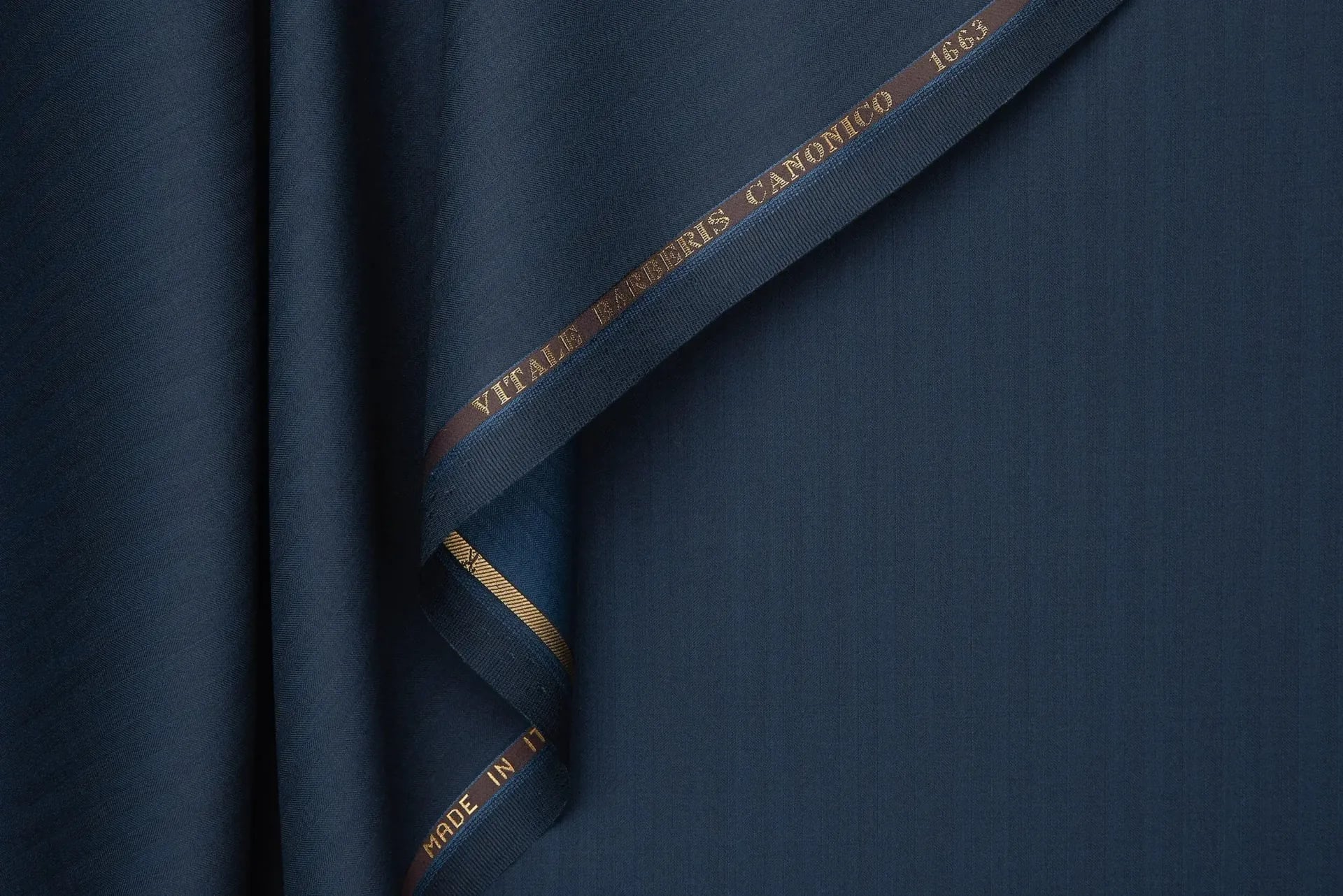 Lustrous navy silk-blend cloth with a soft sheen and branded selvedge