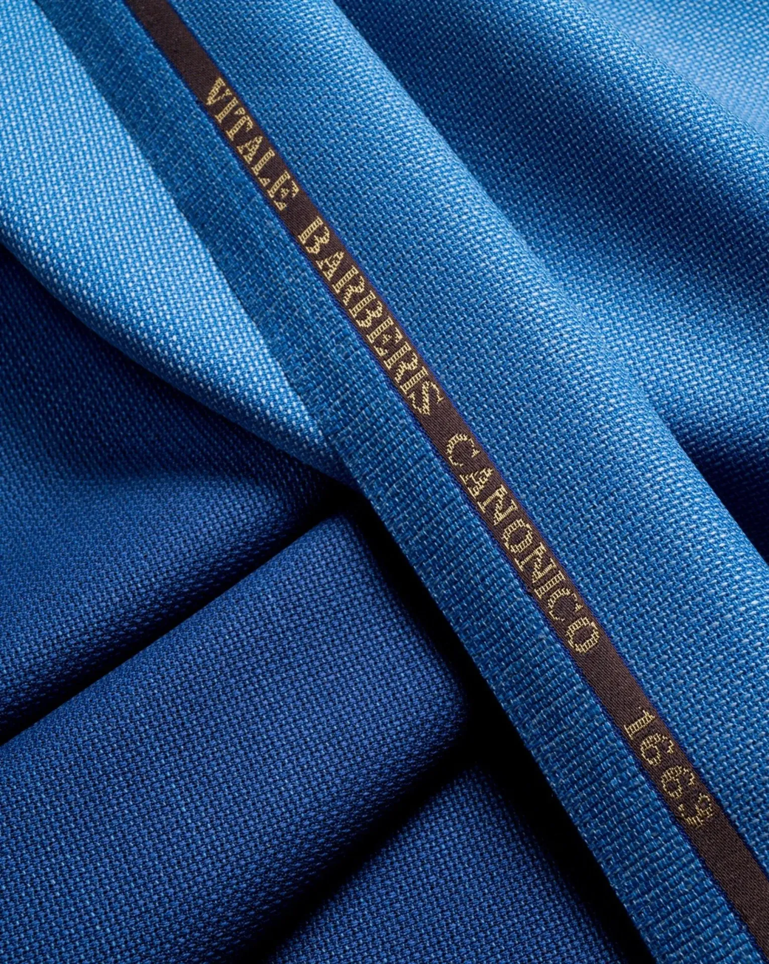 VBC Montecarlo hopsack in bright and royal blue, open textured weave with woven selvedge