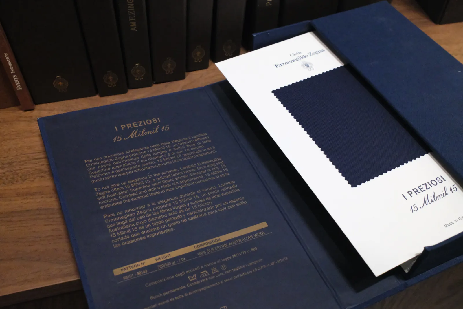 Ermenegildo Zegna I Preziosi 15 Milmil 15 fabric bunch open with a navy swatch at the Endel Tailor Bangkok atelier